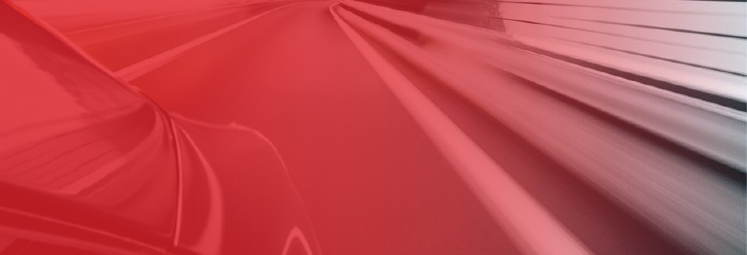 Background image of side of car and road travelling at speed